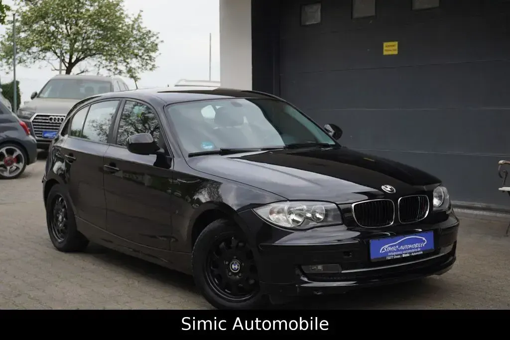 Second-hand BMW 116 122 CP (89 kW) 2011 Negru Hatchback