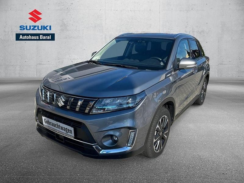 Grau Gebraucht 2021 Suzuki Vitara Comfort+ SUV | 20.980 € (Etwas zu teuer) - Bild 1/4