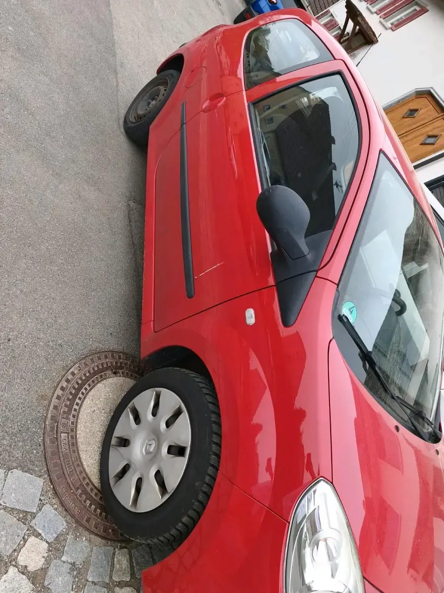 Second-hand Renault Twingo 60 CP (44 kW) 2009 Roșu Hatchback