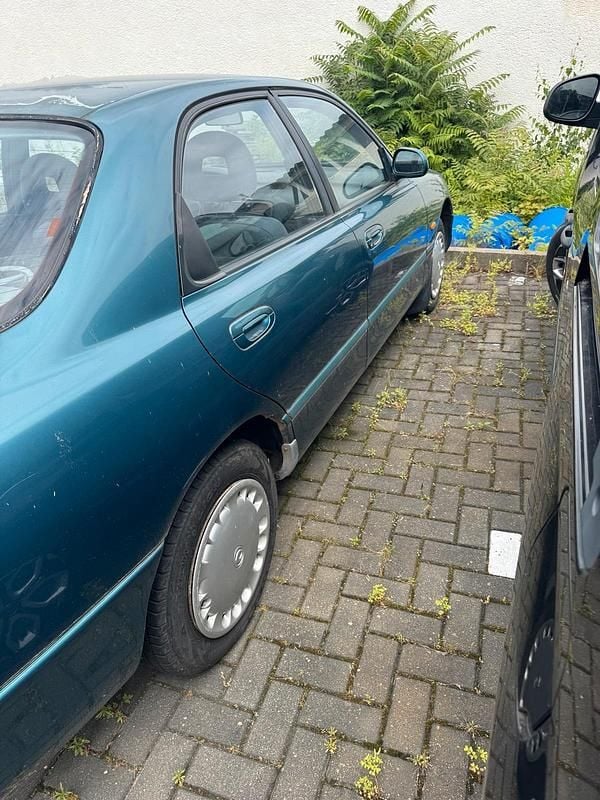 Second-hand Mazda 626 116 CP (85 kW) 1995 Albastru Berlinǎ