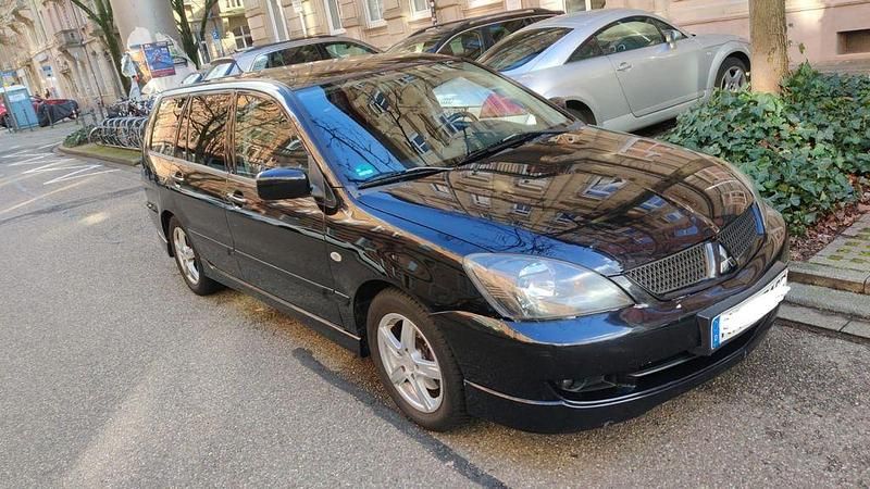Schwarz Gebraucht 2006 Mitsubishi Lancer Kombi | 1.199 € (Fairer Preis) - Bild 1/4