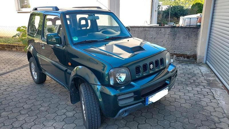 Grün Gebraucht 2007 Suzuki Jimny SUV | 7.000 € - Bild 1/4