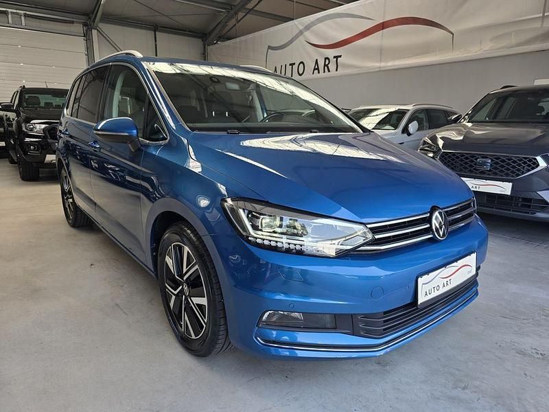 Caribbean blue metallic Gebraucht 2020 VW Touran Highline Van / Kleinbus | 23.900 € (Fairer Preis) - Bild 1/4
