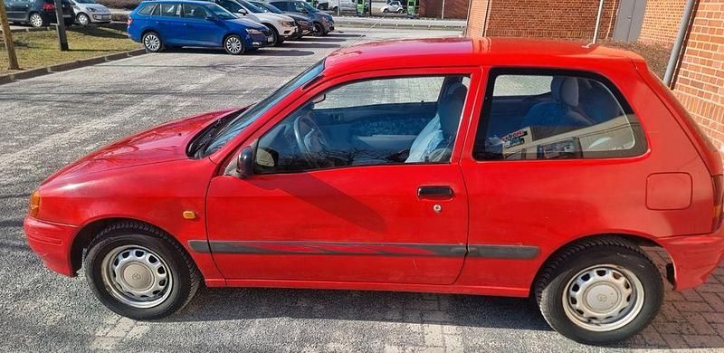 Gebraucht Toyota Starlet 75 PS (55 kW) 1998 Rot Kleinwagen