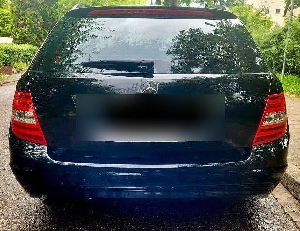 Gebraucht Mercedes C200 Elegance 136 PS (100 kW) 2013 Schwarz Kombi