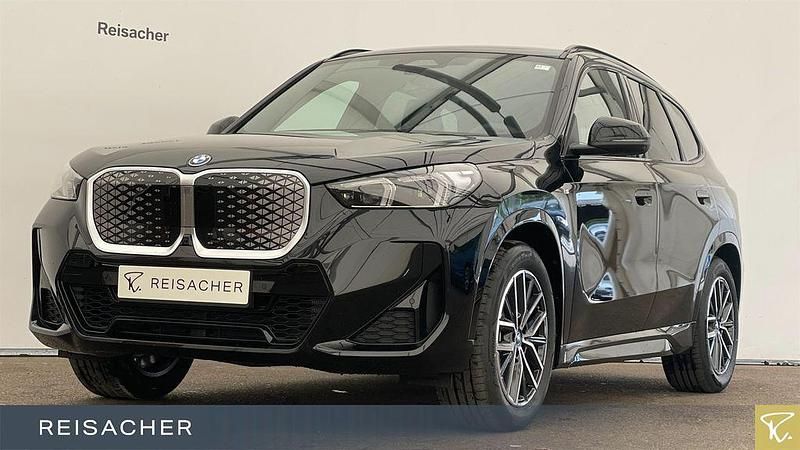 Schwarz Neu 2025 BMW iX1 M Sport SUV | 54.495 € (Fairer Preis) - Bild 1/4