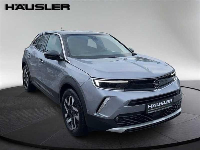 Gebraucht Opel Mokka-e Elegance 100 kW (136 PS) 2022 Quarz silber (metallic) SUV