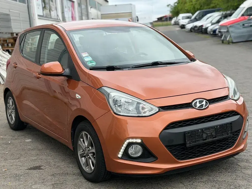 Gebraucht Hyundai i10 Intro Edition 87 PS (63 kW) 2014 Orange Kleinwagen