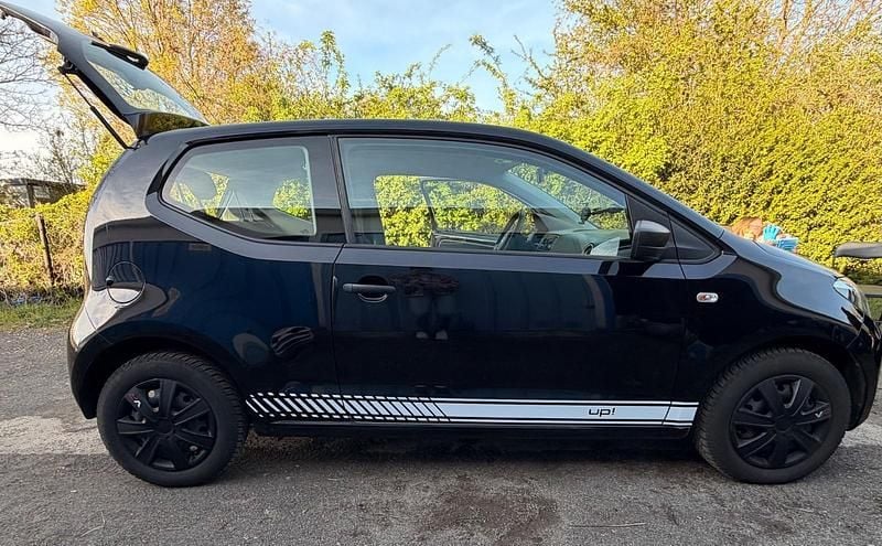 Usado VW up! 59 CV (43 kW) 2012 Negro Utilitario