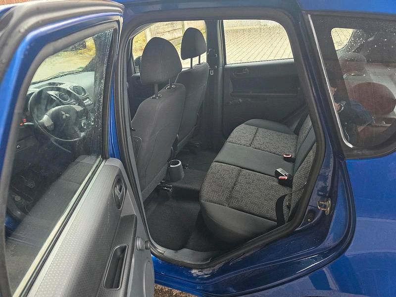 Gebraucht Mitsubishi Colt 95 PS (69 kW) 2009 Blau Kleinwagen