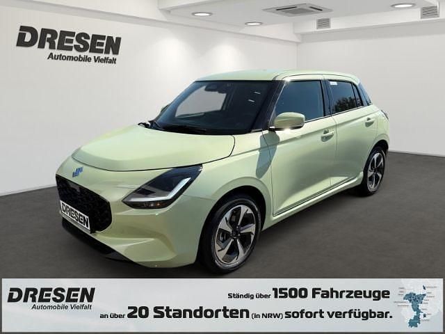 Cool yellow metallic Neu 2025 Suzuki Swift Comfort+ Kleinwagen | 18.550 € - Bild 1/4