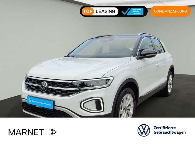 Pure white/schwarz Gebraucht 2024 VW T-Roc Style SUV | 25.930 € (Fairer Preis) - Bild 1/3