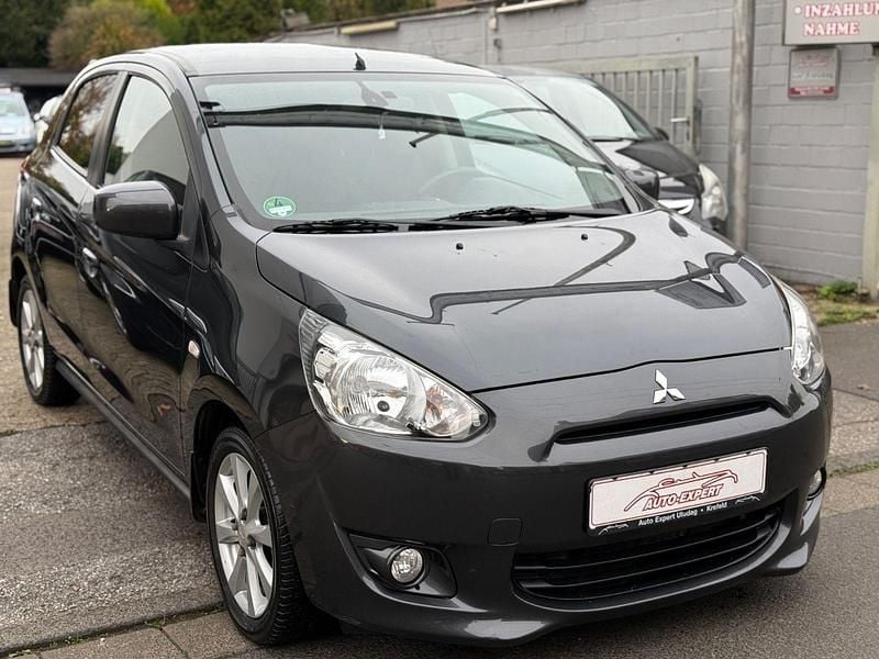 Grau Gebraucht 2013 Mitsubishi Space Star Kleinwagen | 5.990 € (Fairer Preis) - Bild 1/4