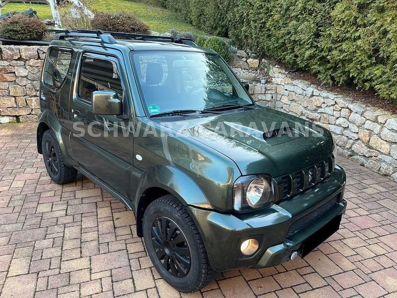 Grau Gebraucht 2015 Suzuki Jimny Club SUV | 17.990 € (Teuer) - Bild 1/4