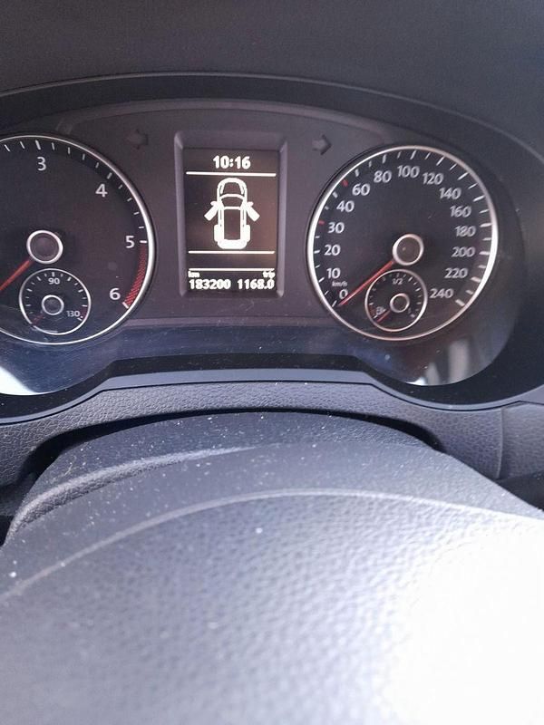 Second-hand VW Sharan 170 CP (125 kW) 2012 Negru Monovolum