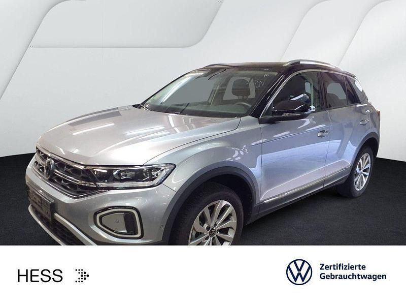 Pyritsilber metallic/schwarz Gebraucht 2025 VW T-Roc Style SUV | 28.449 € (Fairer Preis) - Bild 1/3