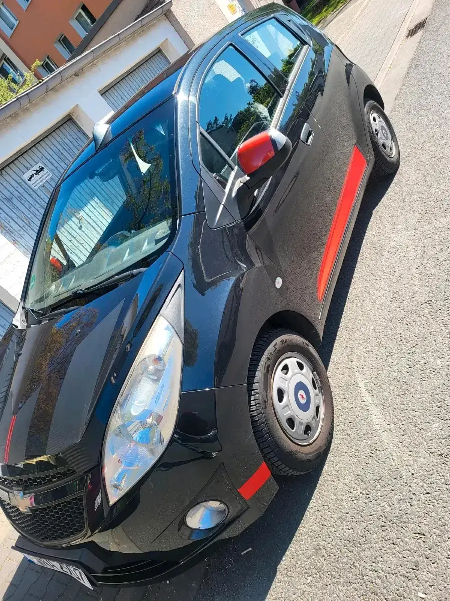 Gebraucht Chevrolet Spark 68 PS (50 kW) 2012 Schwarz Kleinwagen