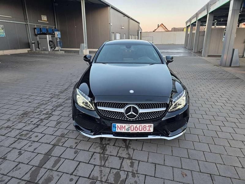 Schwarz unilack Gebraucht 2016 Mercedes C200 AMG line Coupé | 23.800 € (Fairer Preis) - Bild 1/4
