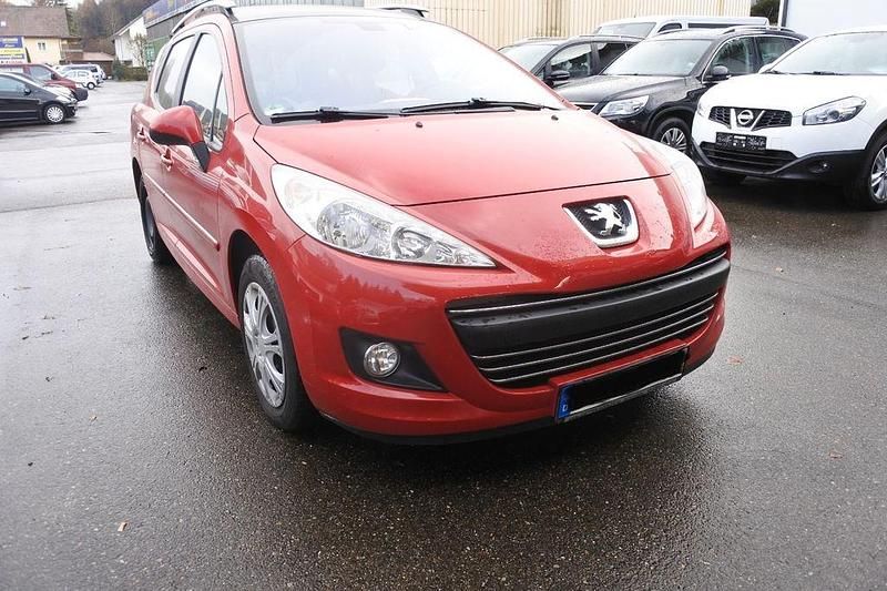 Rot Gebraucht 2009 Peugeot 207 Premium Kombi | 2.899 € (Fairer Preis) - Bild 1/4