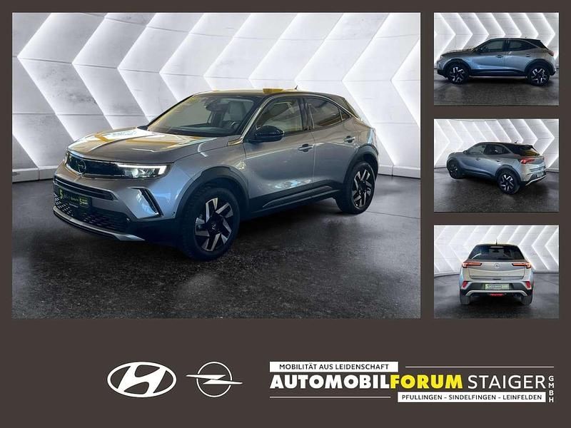 Gebraucht Opel Mokka Elegance 101 PS (74 kW) 2023 Kontrast grau/quarz silber SUV