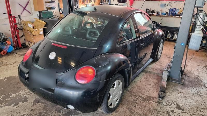 Gebraucht VW New Beetle 115 PS (84 kW) 1999 Schwarz Kleinwagen
