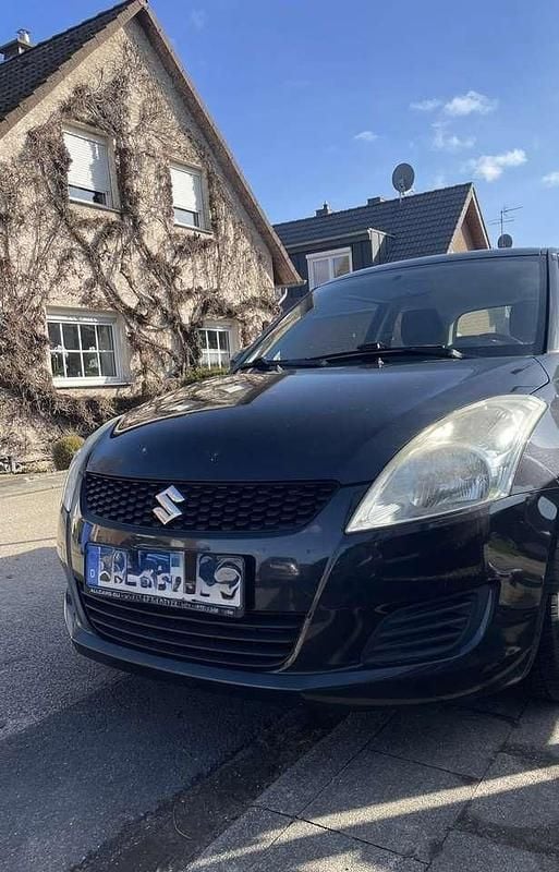 Gebraucht Suzuki Swift Basic 94 PS (69 kW) 2013 Schwarz Kleinwagen