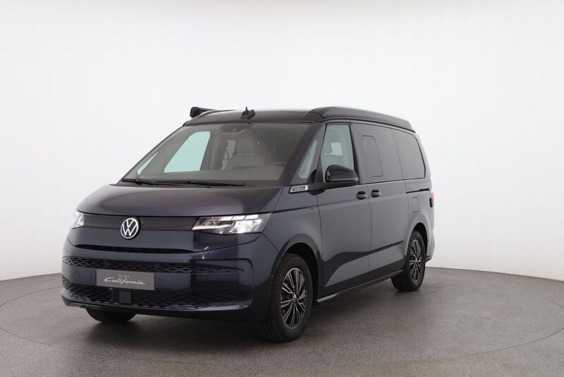 Starlightblue met./deepblack p Gebraucht 2024 VW T7 Coast Van | 73.530 € (Teuer) - Bild 1/4