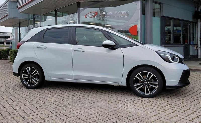 Gebraucht Honda Jazz Advance 107 PS (78 kW) 2024 Premium sunlight white Kleinwagen