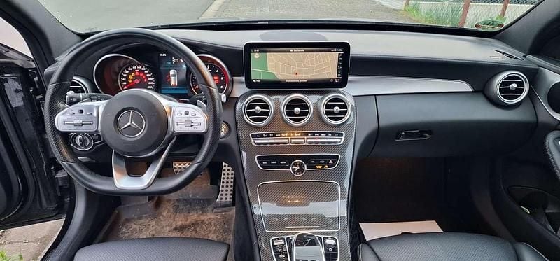 Schwarz Gebraucht 2018 Mercedes C220 AMG line Kombi | 25.900 € (Guter Preis) - Bild 1/4
