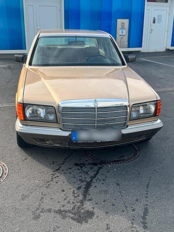 Gold Gebraucht 1986 Mercedes 500 Limousine | 9.600 € - Bild 1/4