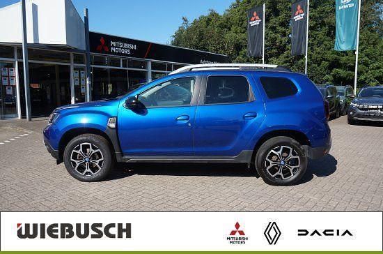 Blau Gebraucht 2021 Dacia Duster Celebration SUV | 14.690 € (Superpreis) - Bild 1/4