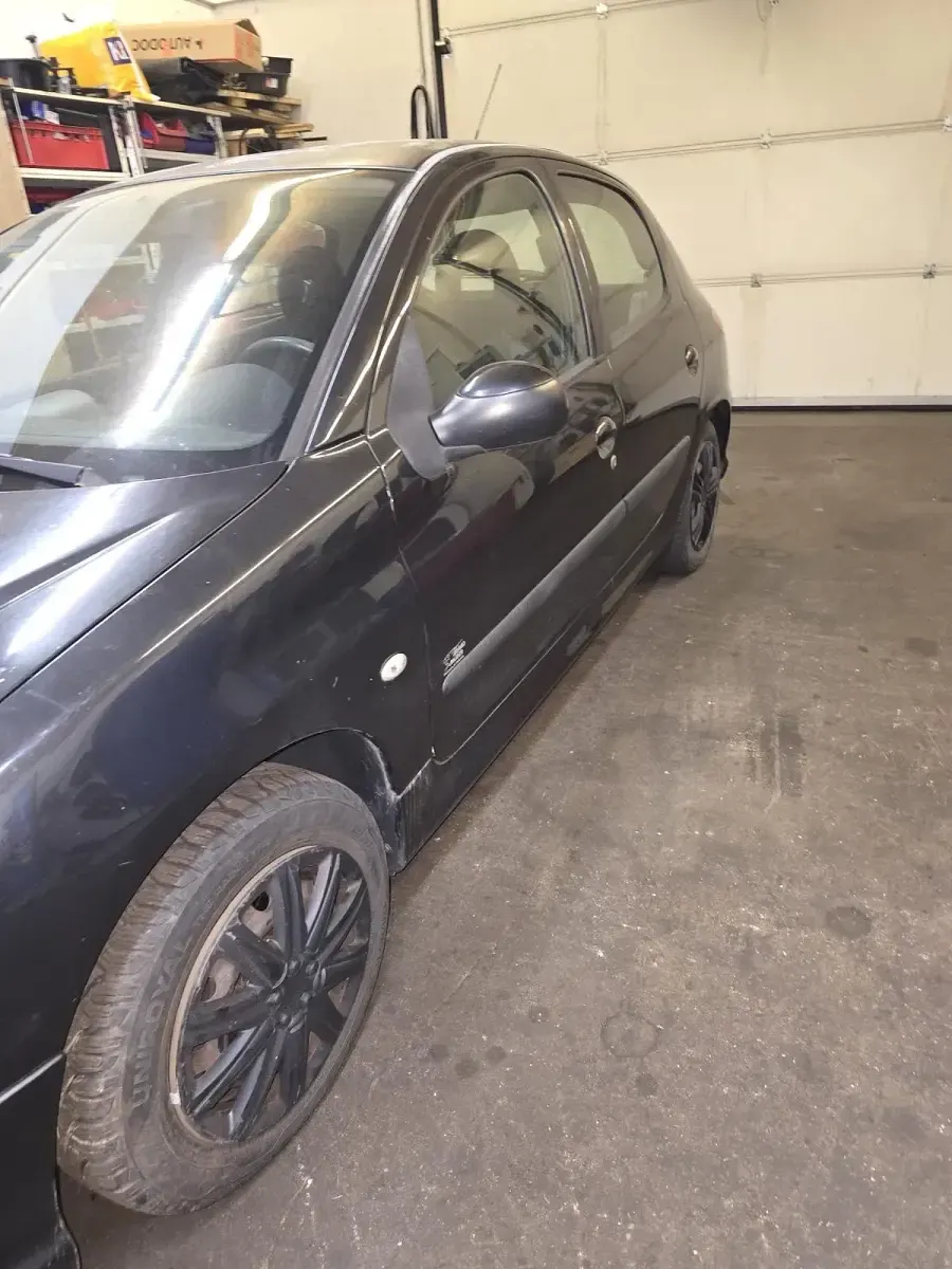 Gebraucht Peugeot 206 75 PS (55 kW) 2006 Schwarz Kleinwagen