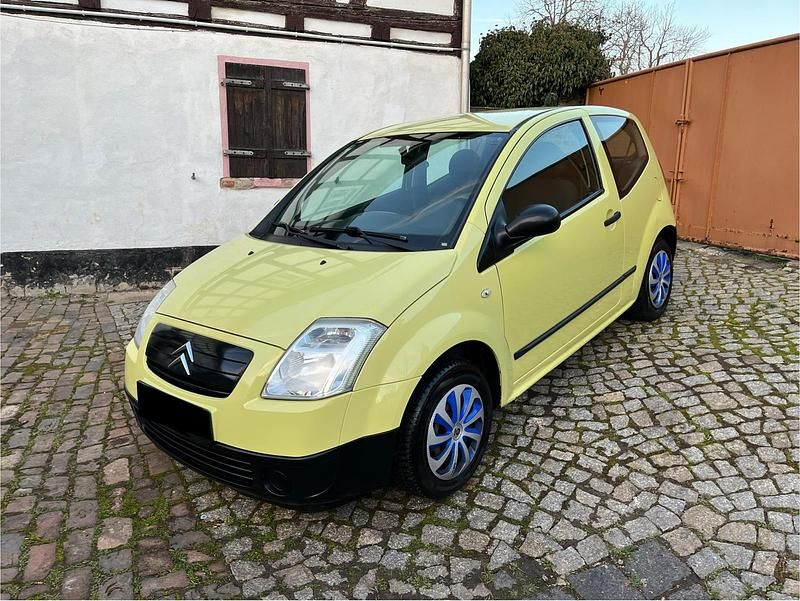Gelb Gebraucht 2007 Citroën C2 Kleinwagen | 990 € - Bild 1/4