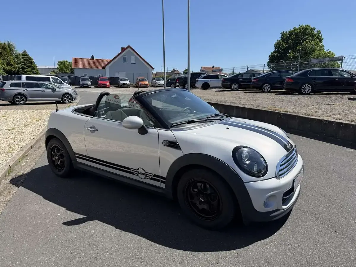 Gebraucht Mini Cooper Cabriolet 122 PS (89 kW) 2012 White silver metallic Cabrio