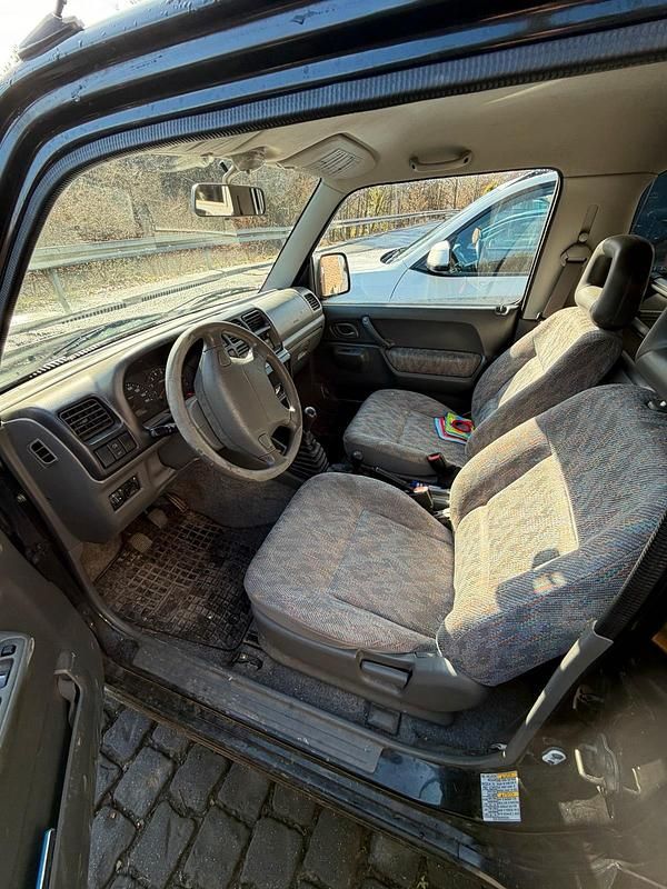 Gebraucht Suzuki Jimny 80 PS (58 kW) 2000 Schwarz SUV