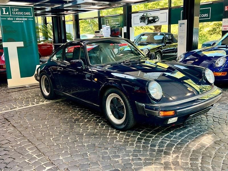 Blau Gebraucht 1987 Porsche 911 Carrera Coupé | 79.800 € - Bild 1/4