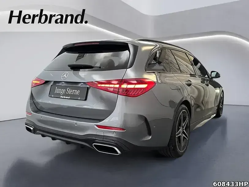 Gebraucht Mercedes C300 AMG 265 PS (194 kW) 2022 Metalliclack selenitgrau Kombi