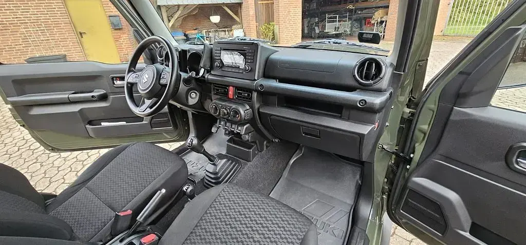 Gebraucht Suzuki Jimny 102 PS (75 kW) 2021 Grün SUV