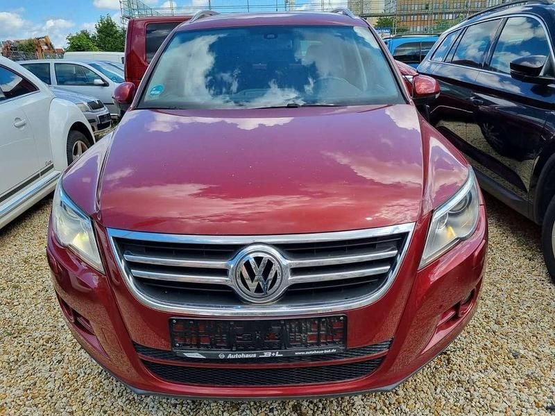Wild cherry red metallic Gebraucht 2009 VW Tiguan Sport SUV | 6.900 € (Superpreis) - Bild 1/4