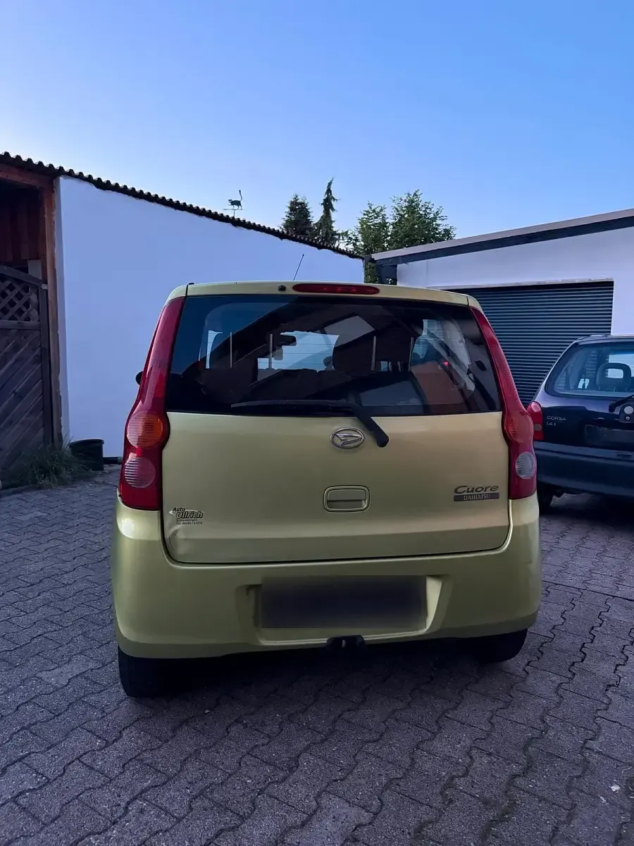 Brugt Daihatsu Cuore 70 HK (51 kW) 2010 Grøn Hatchback