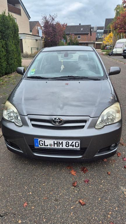 Grau Gebraucht 2004 Toyota Corolla Limousine | 3.900 € (Fairer Preis) - Bild 1/4