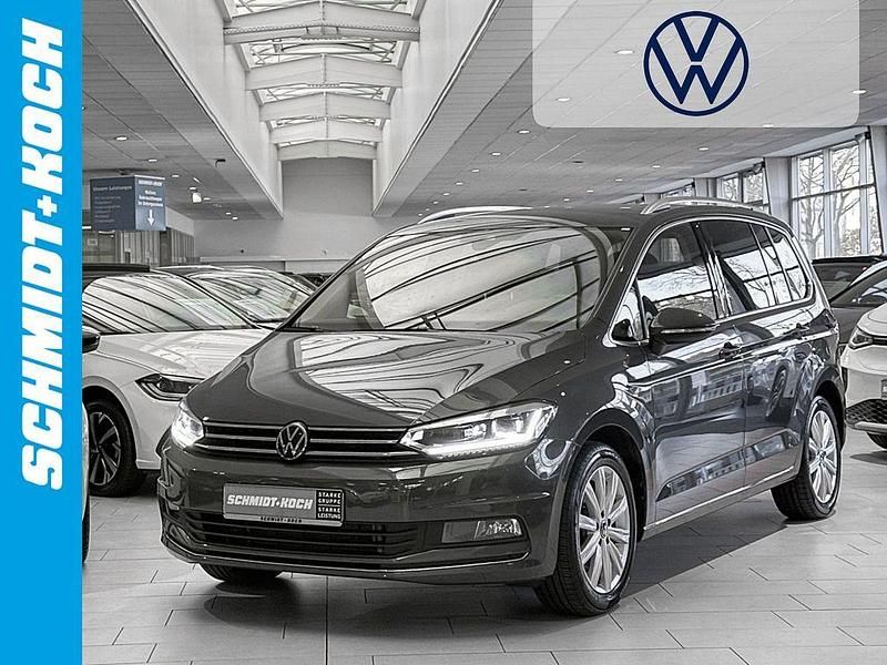 Gebraucht VW Touran Highline 150 PS (110 kW) 2024 Delfingrau (grau) Van / Kleinbus