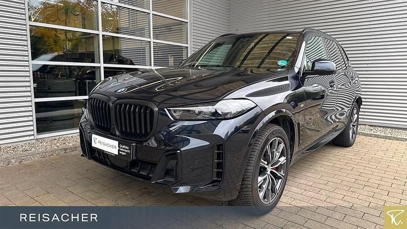 Carbonschwarz metallic Gebraucht 2024 BMW X5 Comfort Edition SUV | 75.619 € - Bild 1/4