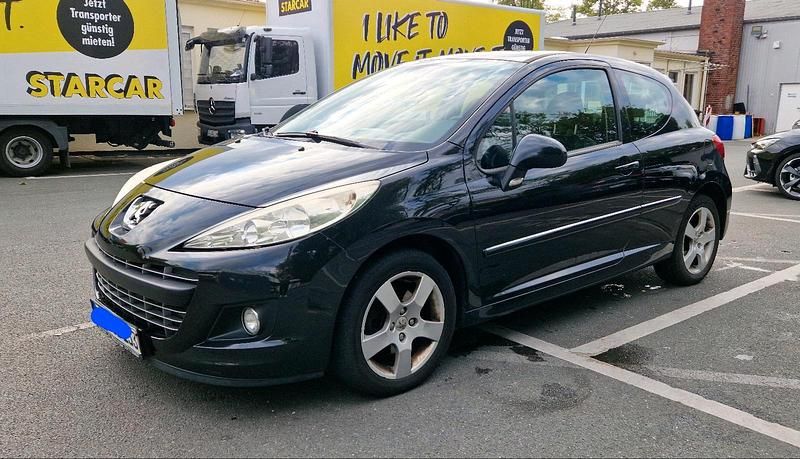 Schwarz Gebraucht 2011 Peugeot 207 Platinum Kleinwagen | 2.000 € - Bild 1/4