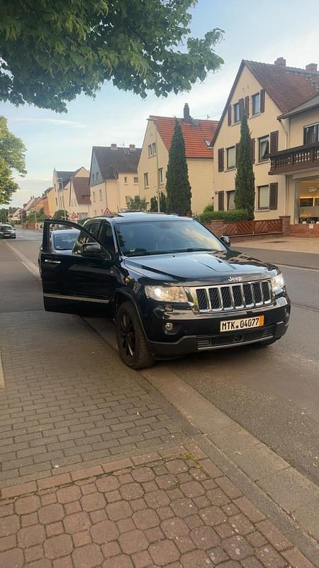 Gebraucht Jeep Grand Cherokee Overland 241 PS (177 kW) 2012 Schwarz SUV