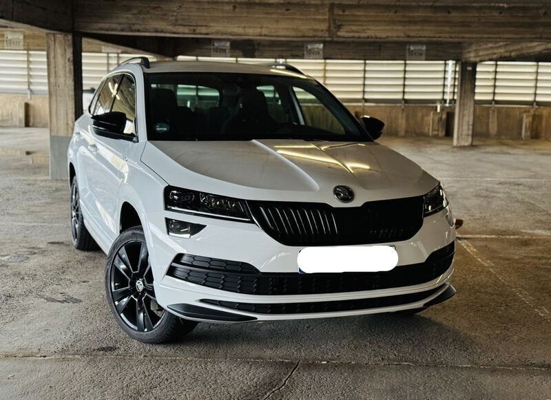Weiß Gebraucht 2019 Skoda Karoq SportLine SUV | 22.985 € (Guter Preis) - Bild 1/4