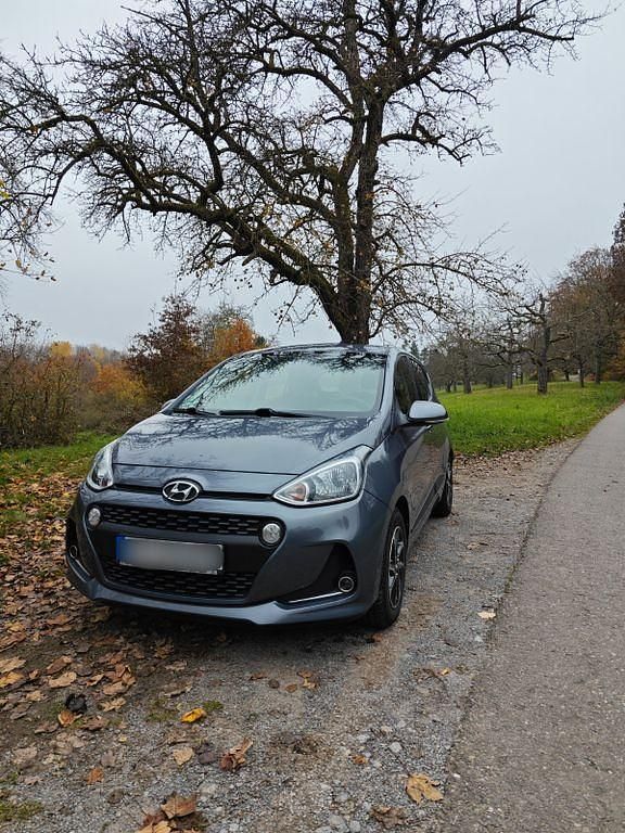 Grau Gebraucht 2018 Hyundai i10 Style Kleinwagen | 10.499 € (Fairer Preis) - Bild 1/4