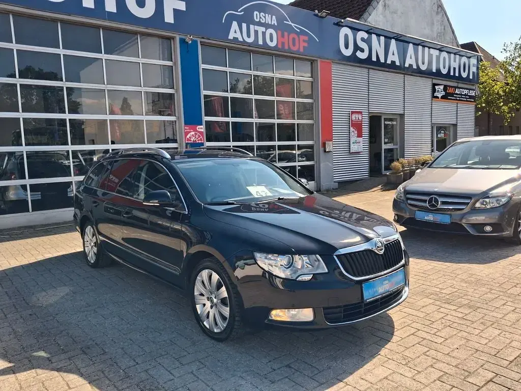 Używany Skoda Superb Elegance 170 KM (125 kW) 2012 Czarny Kombi