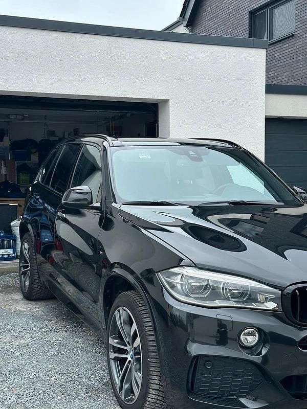 Second-hand BMW X5 Performance 382 CP (280 kW) 2014 Negru SUV