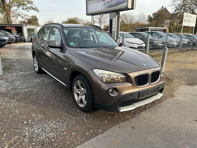 Braun Gebraucht 2011 BMW X1 Sport Line SUV | 8.950 € (Fairer Preis) - Bild 1/4